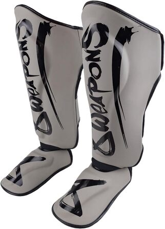 ЗБРОЇ Щитки для гомілок Unlimited 2.0, піщано-чорні, для тренувань та змагань, високоякісна синтетична шкіра та ідеальна амортизація, для муай-тай, K1, MMA, карате та кікбоксингу, 8