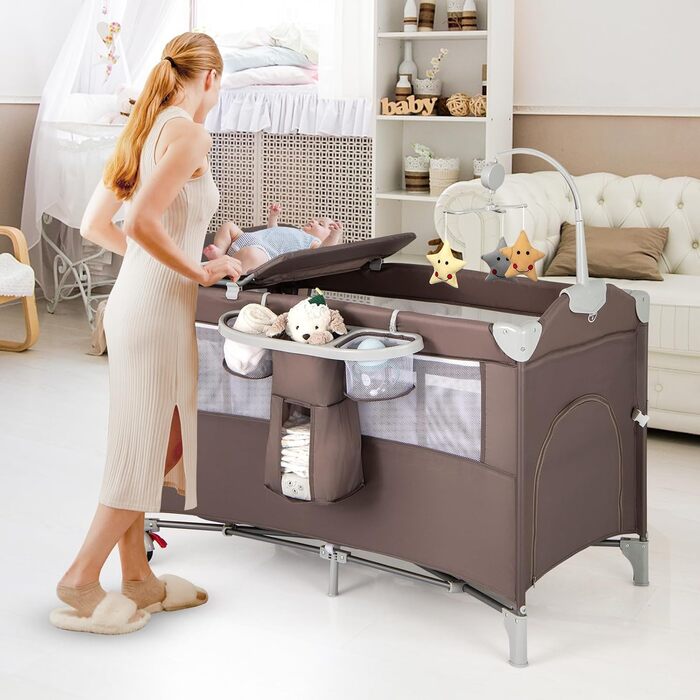Складане дитяче ліжечко LIFEZEAL з пеленальний столик, дорожнє ліжечко з ігровою аркою та музичними дзвіночками, мобільне дитяче дорожнє ліжечко з сумкою для зберігання, для немовлят 0-36 місяців (коричневе)