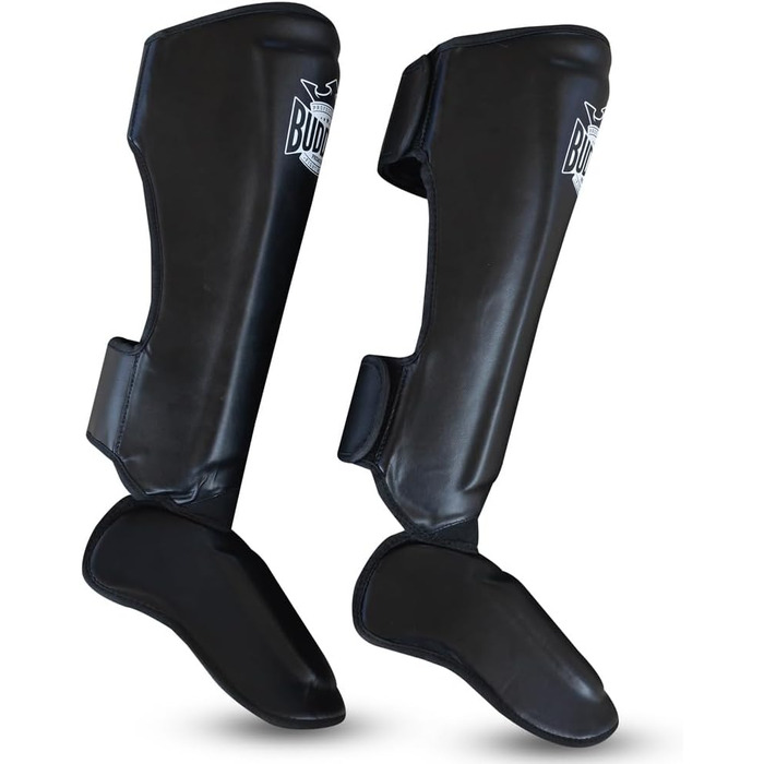 ОДЯГ BUDDHA FIGHT WEAR Епічна модель щитка для муай-тай, ММА та кікбоксингу Виготовлено зі синтетичної шкіри останнього покоління Більш міцні та посилені шви Чорний M