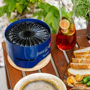 Настільний гриль Feuerhand Tamber синього кольору Емальована решітка для гриля З антипригарним покриттям Горіння з низьким рівнем диму Зливні канавки для мастила та рідин, що подаються зі столом гриль на вугіллі