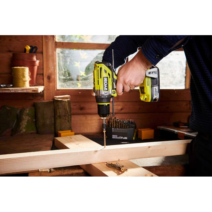 Акумуляторний ударний дриль Ryobi (18 В, функція ударного свердління, з 2-ма акумуляторами 2,0 Ач, швидкозатискний патрон) R18PD7-