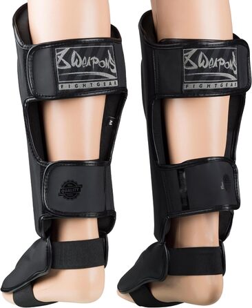 ЗБРОЇ Щитки для гомілок Unlimited 2.0, матово-чорні, для тренувань та змагань, високоякісна синтетична шкіра та ідеальна амортизація, муай-тай, K1, MMA, карате та кікбоксинг, 8