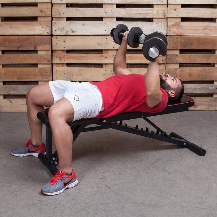 Професійна гантель Лава для тренажерів Premium Line Лава з багаторівневим регулюванням нахилу Надзвичайно вантажопідйомна вага 550 кг 21 тренувальне положення З опорою для ніг Включає посібник з тренувань для лави