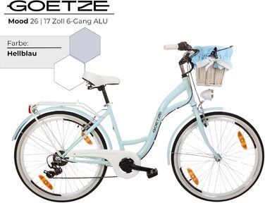 Дитячий велосипед Goetze Mood 26 дюймів, 17-дюймова алюмінієва рама з кріпленням, 6-швидкісний перемикач швидкостей, подвійні V-подібні гальма, світлодіодне освітлення, кошик з ротанга, комфортне сідло, з бічною підставкою та дзвінком, світло-блакитний