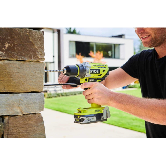 Акумуляторний ударний дриль Ryobi (18 В, функція ударного свердління, з 2-ма акумуляторами 2,0 Ач, швидкозатискний патрон) R18PD7-