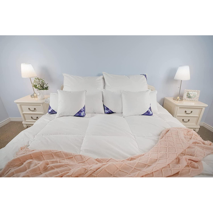 Комплект із 2 пухових подушок 3-камерні подушки 80x80 см Вага наповнювача 1600 грамів Чохол зі 100 бавовни Пухова подушка 80x80 Пухова подушка Не вищипує живих істот Білий