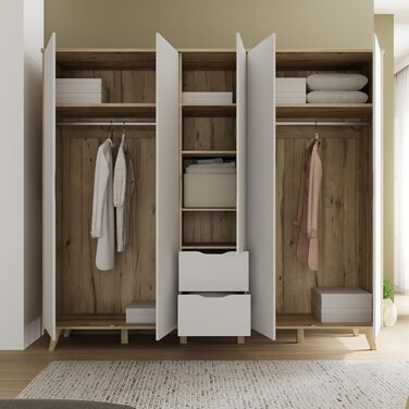 Гардероб Forte VANKKA 230, шафа в скандинавському стилі з 5 дверима на петлях та 2 шухлядами, витончені меблеві ніжки, інженерна деревина, декор дубовими дошками Білий, 228,8 см завширшки x 201,5 см заввишки x 52,7 см завглибшки. Біло-дубова 5-дверна шафа