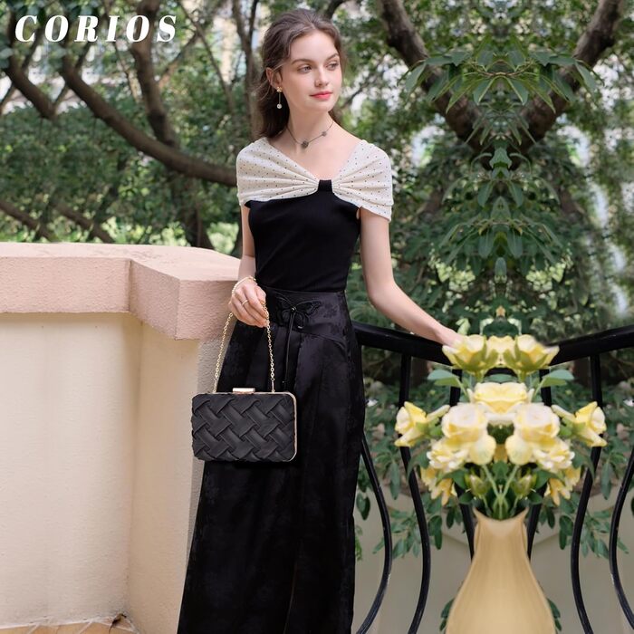 Елегантна вечірня сумочка-клатч для весілля, вечірки або випускного. Розкішна мініатюрна сумочка на ланцюжку через плече, чорного кольору.