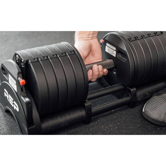 Регульовані гантелі Rep Fitness Quickdraw, доступні в кількох діапазонах ваги, включаючи 5-30, 5-40, 5-50 та 2,3-27,2 кг, 2,3 - 18 кг