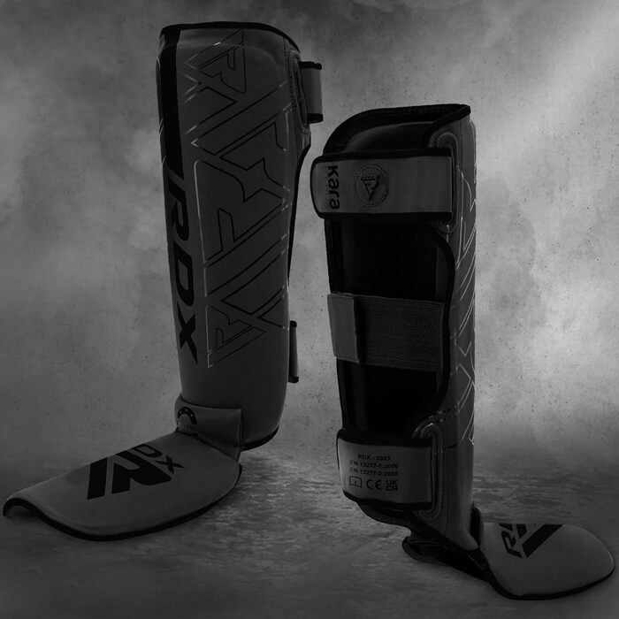 Щитки для гомілок RDX для тайського боксу, кікбоксингу, бойових мистецтв, тренувань змішаних бойових мистецтв (MMA), Maya Hide, шкіри, кара, захисту гомілок, муай-тай, крав-мага, спарингу, бразильського джиу-джитсу, карате та бойових мистецтв, захисту ніг