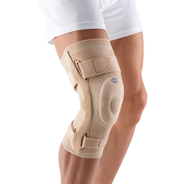 Колінний бандаж BAUERFEIND GenuTrain S Дихаючий в&39язаний компресійний колінний бандаж для полегшення болю та набряку, спричинених артритом, травмами передньої хрестоподібної зв&39язки, розривами меніска, захворюваннями. (упаковка з 1) Правий бежевий