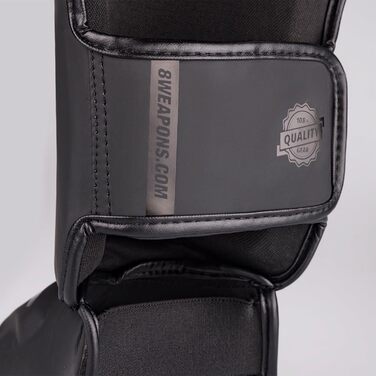 ЗБРОЇ Щитки для гомілок Unlimited 2.0, матово-чорні, для тренувань та змагань, високоякісна синтетична шкіра та ідеальна амортизація, муай-тай, K1, MMA, карате та кікбоксинг, 8