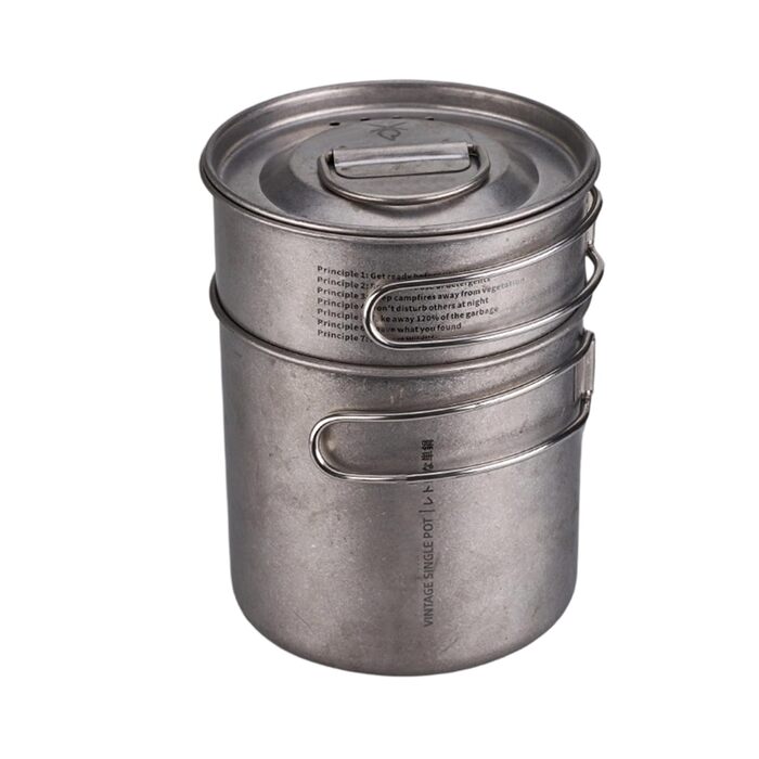 Складаний набір кемпінгового посуду для використання на свіжому повітрі, включаючи кемпінгову сковороду та горщики для пікніка для піших прогулянок та походів.