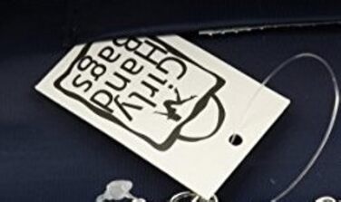 Вишукана сумочка-клатч Умшлаг з металевою рамкою та делікатним ремінцем