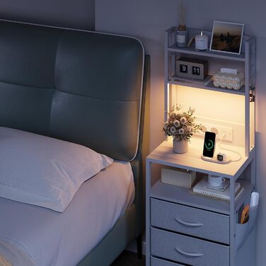 Приліжковий столик Dripex із функцією зарядки та світлодіодним підсвічуванням, бічний столик із 3 тканинними шухлядами, тумбочка з книжковою полицею, відкритим відділенням, 2 порти змінного струму, 1 USB та 1 порт типу C, для спальні, вітальні, офісу (біл