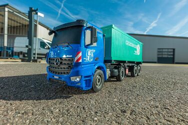 Радіокерований тягач Arocs з контейнером, модель 120, RTR (повністю готовий до використання), зі світлом та звуком, в комплекті батарейки та пульт керування, час роботи до 30 хвилин.