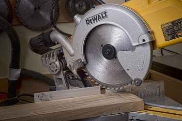 Панельна пила Dewalt 250 мм DWS778 (1850 Вт, регулювання косинки 50 вліво і вправо, максимальна глибина різання 85 мм, розміри пил